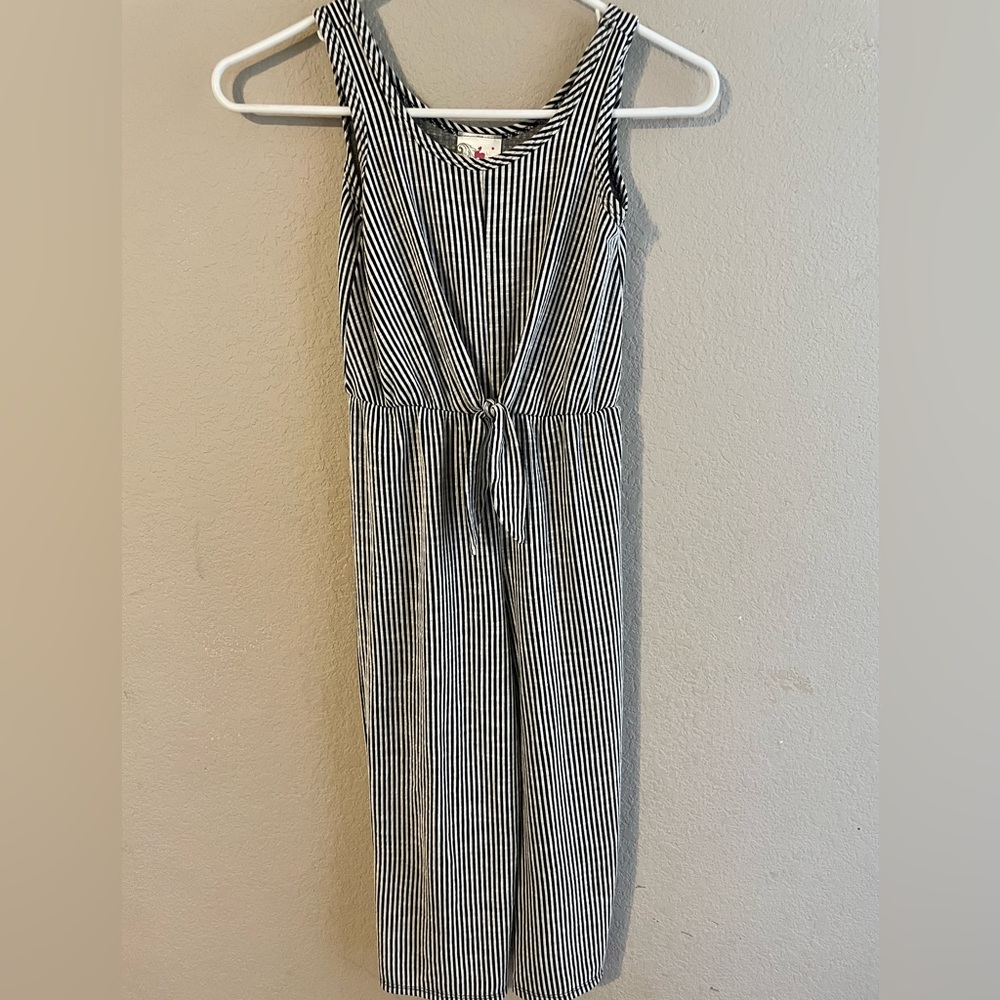 Girls size 8, black and white striped jumpsuit